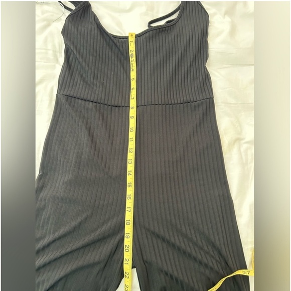 Pretty Little Thing black romper/jumper.
Spaghetti straps size 12 - Picture 6 of 7